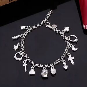 .925 Sterling Silver 13 Charms Bracelet